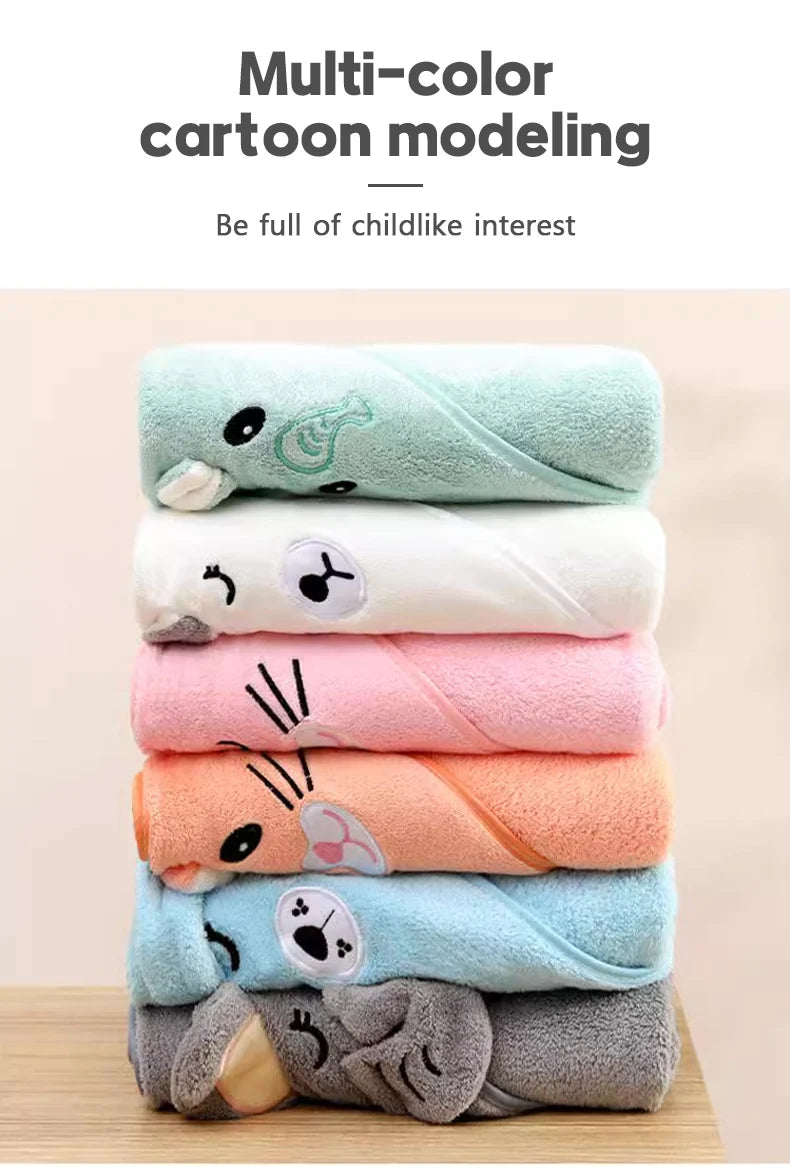 Colorful stack of hooded newborn towels with cute animal designs for playful bath time enjoyment
