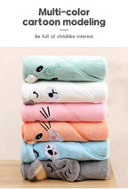 Colorful stack of hooded newborn towels with cute animal designs for playful bath time enjoyment