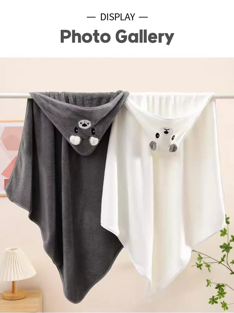 Two soft hooded newborn towels with cute animal faces, in gray and white colors