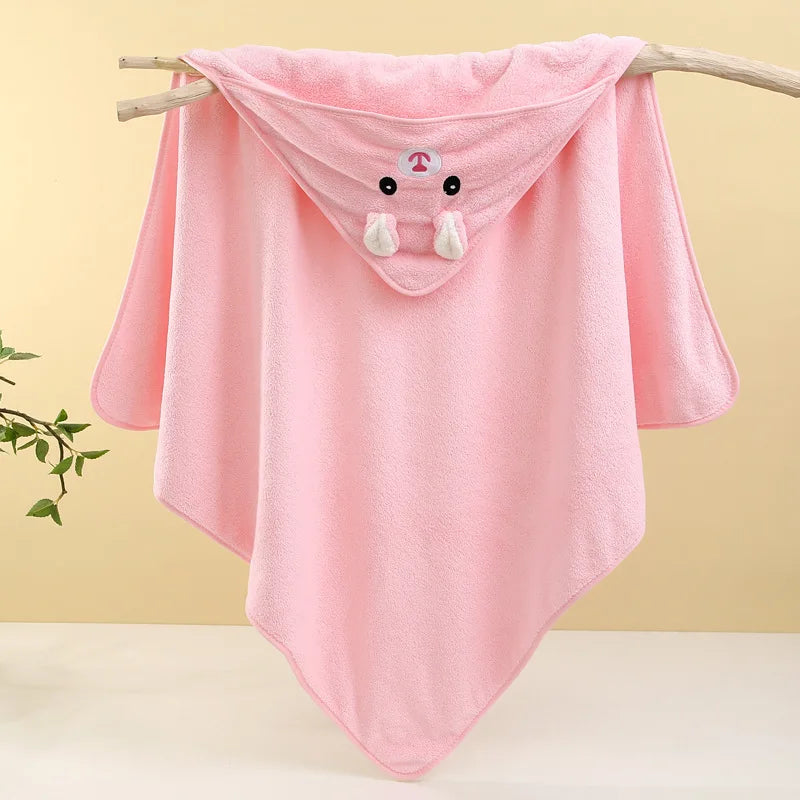 Soft pink hooded newborn towel with bunny design, perfect for keeping babies warm and cozy after bath time