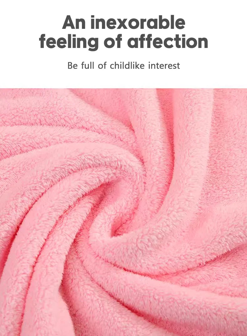 Soft pink hooded newborn towel made from plush material for gentle drying and warmth