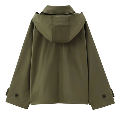 Back view of a women's cropped windbreaker jacket in olive green with a hood and stylish oversized sleeves