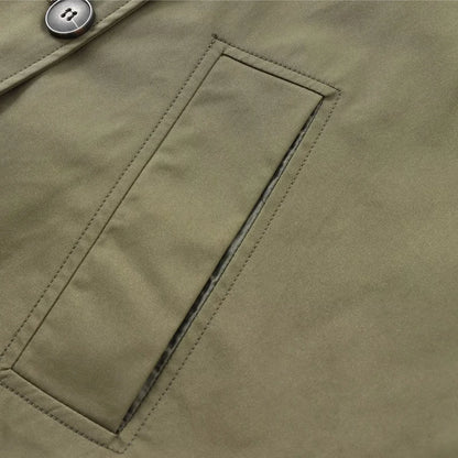 Close-up of women's cropped windbreaker jacket with a stylish front pocket detail