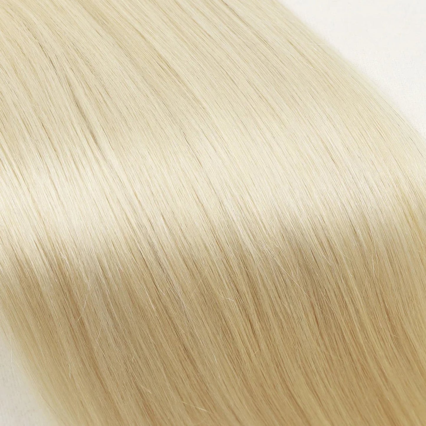 Long straight i tip human hair extensions in light blonde from LuckeLadybug LLC