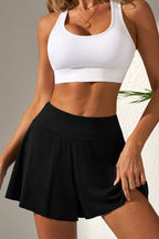 LuckeLadybug LLC skort in black with a flattering high waist design, perfect for active wear