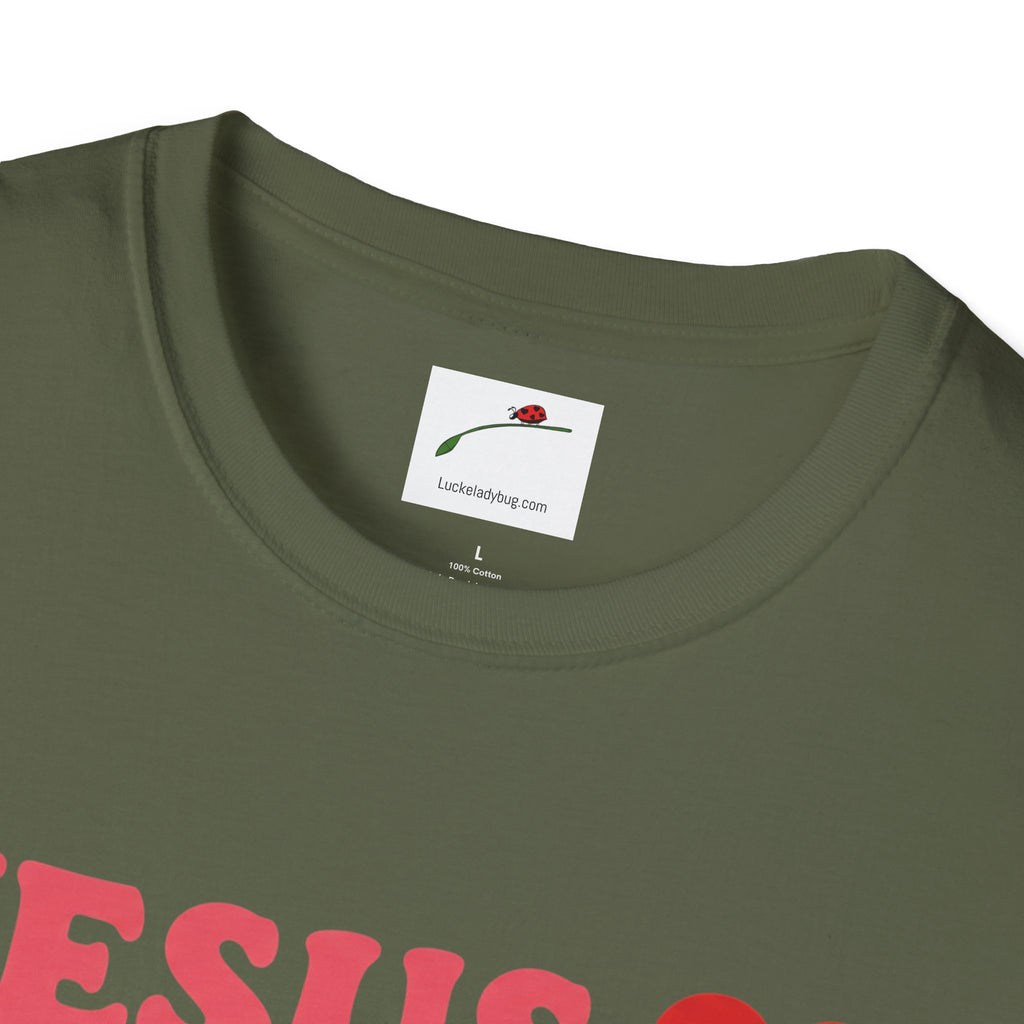 Close-up of olive green Jesus is Love t-shirt by Printify showing neckline and part of printed text