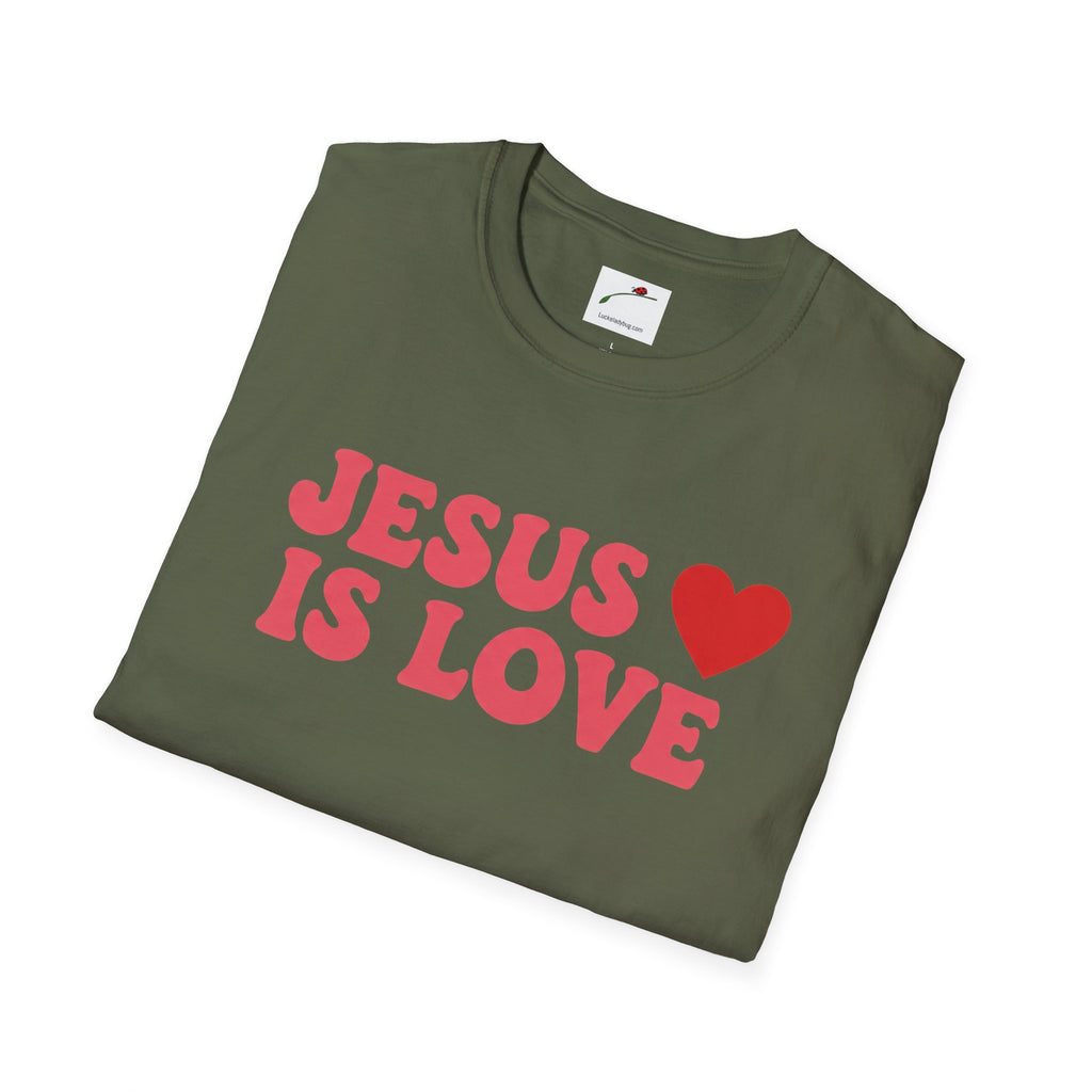 Folded olive green Printify Jesus is Love t-shirt with pink text and red heart graphic
