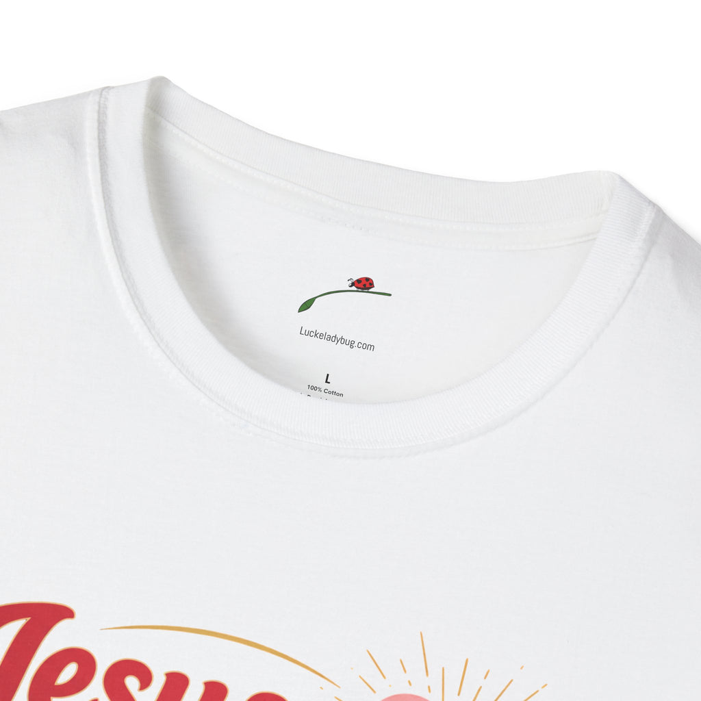 Close-up of white Jesus is Love t-shirt collar and part of printed design by LuckeLadybug