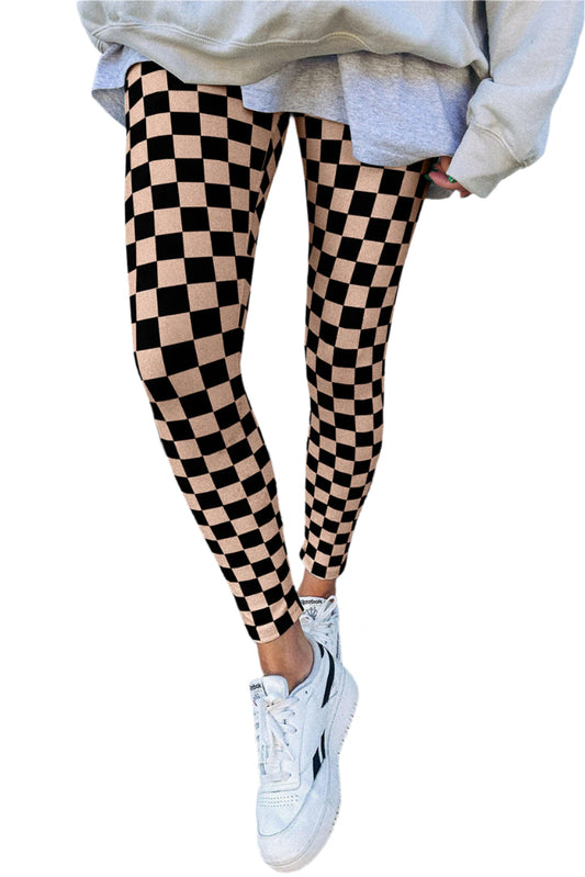 LuckeLadybug khaki checkered leggings worn with white sneakers and oversized gray sweatshirt