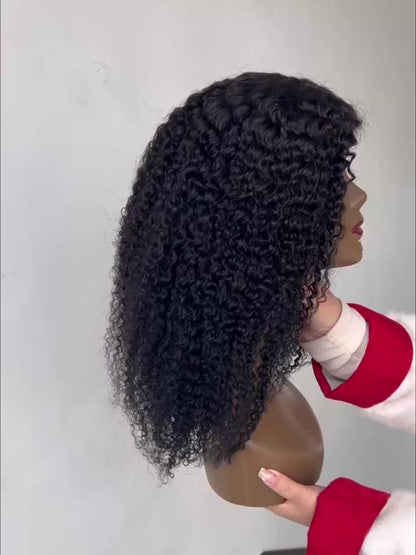 Kinky curly human hair wig displayed on a mannequin, showcasing natural curls and fullness
