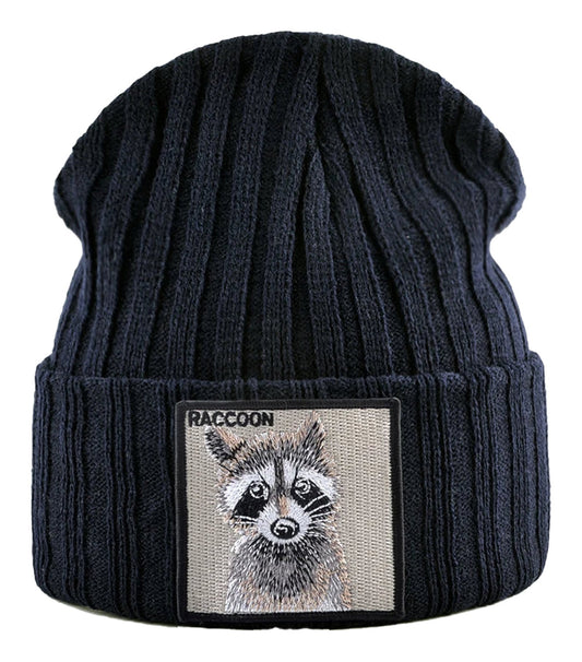 Navy knitted beanie hat with patch featuring a cute raccoon design from LuckeLadybug LLC