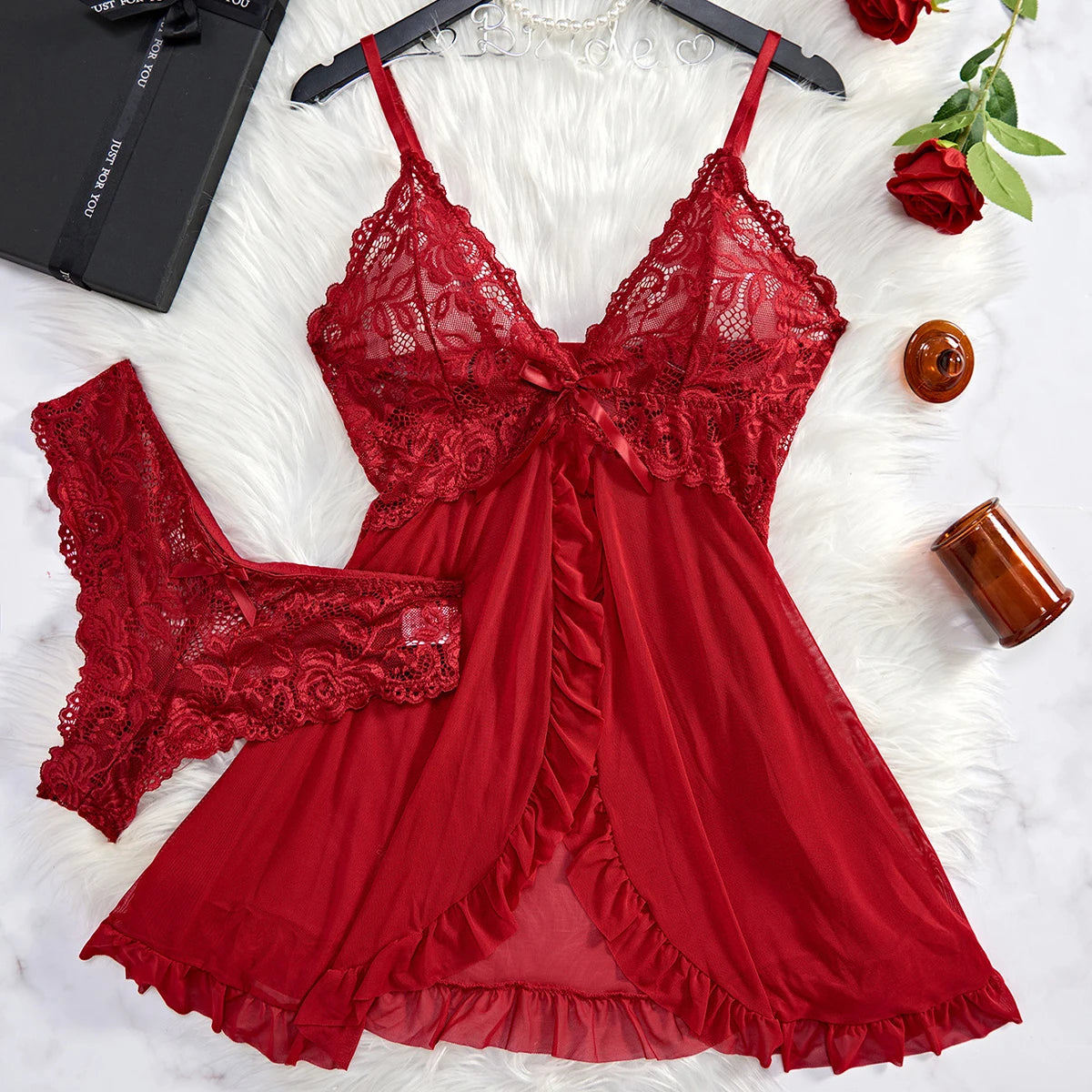Red lace lingerie babydoll with matching lace panties, featuring delicate design and ruffle details