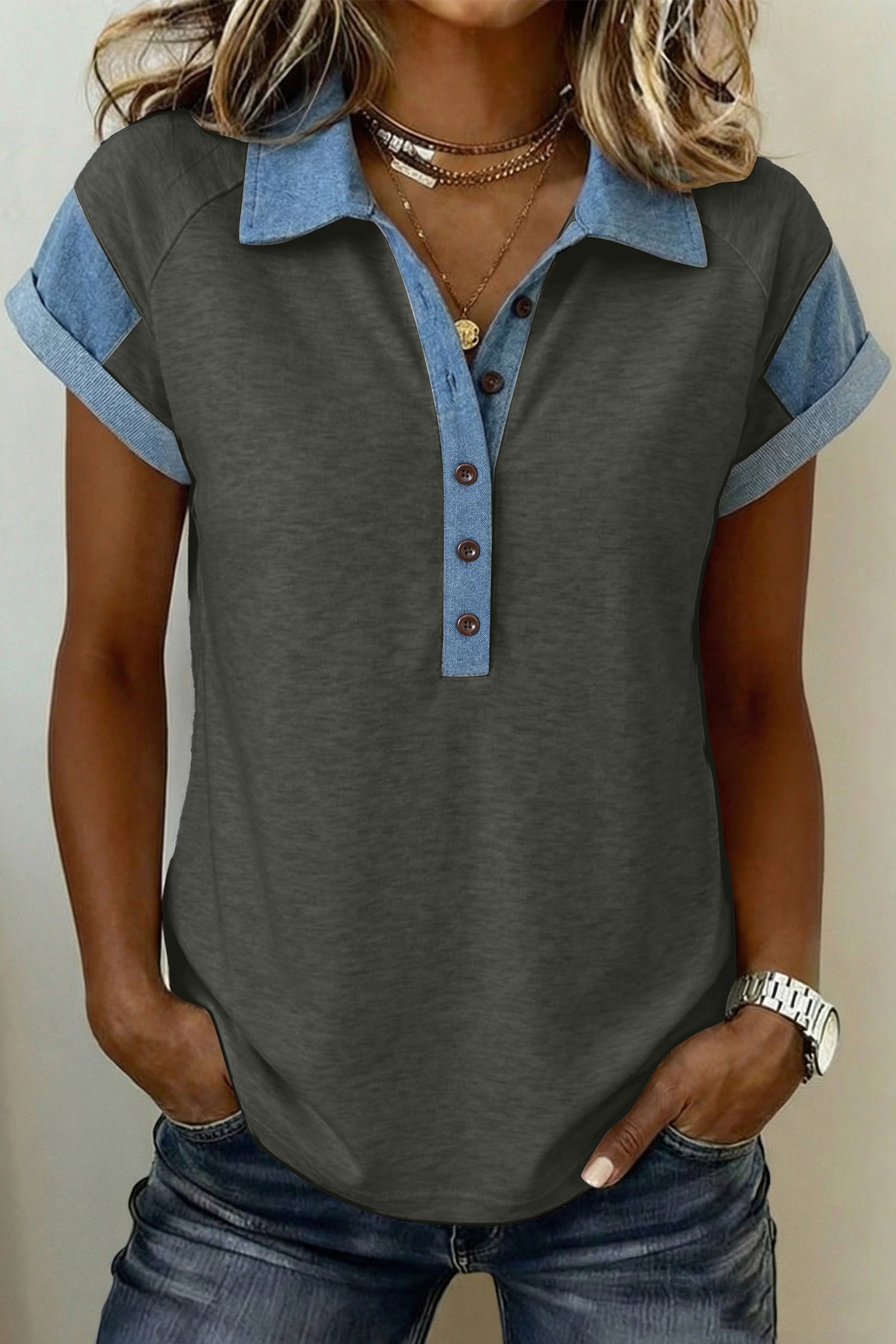 Casual ladies denim blouse with a button-up front and rolled sleeves, perfect for everyday wear