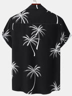 Black ladies tropical shirt with white palm tree prints for a relaxed and stylish summer look