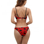Back view of a woman wearing ladybug bikini swimsuit with adjustable black straps