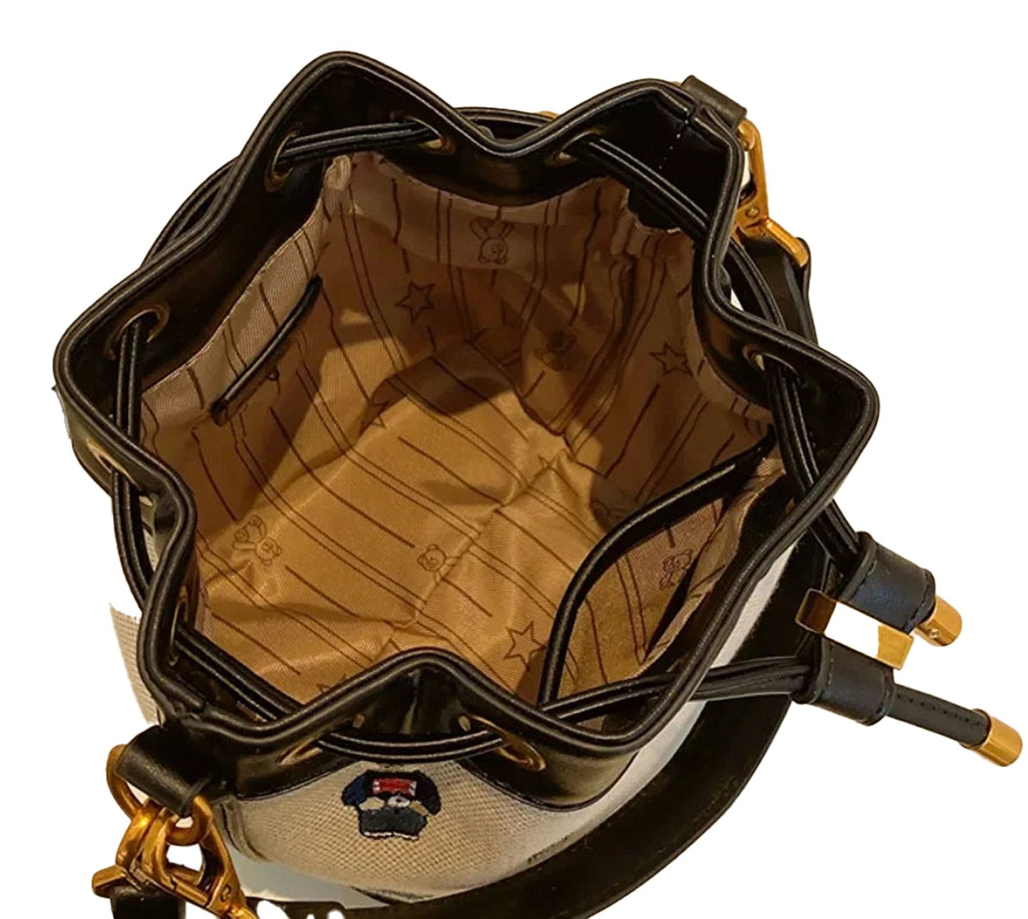 Inside view of a large capacity drawstring bucket bag featuring a spacious and stylish interior