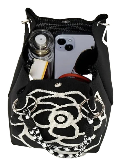 Large knitted tote bag for women with floral design and spacious interior for personal items