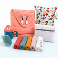 LuckeLadybug Baby Bath Kit with washcloths, bath mitt, laundry care symbols guide, and storage bags