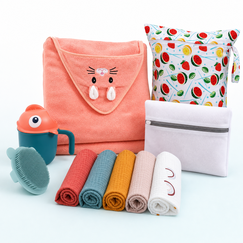 LuckeLadybug Baby Bath Kit with washcloths, bath mitt, laundry care symbols guide, and storage bags