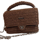 Brown woven clutch purse from ThreadsByHannah featuring a metal heart closure and chain strap