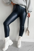 Navy leggings high waist with a sleek design, paired with a cozy gray sweatshirt and stylish white boots