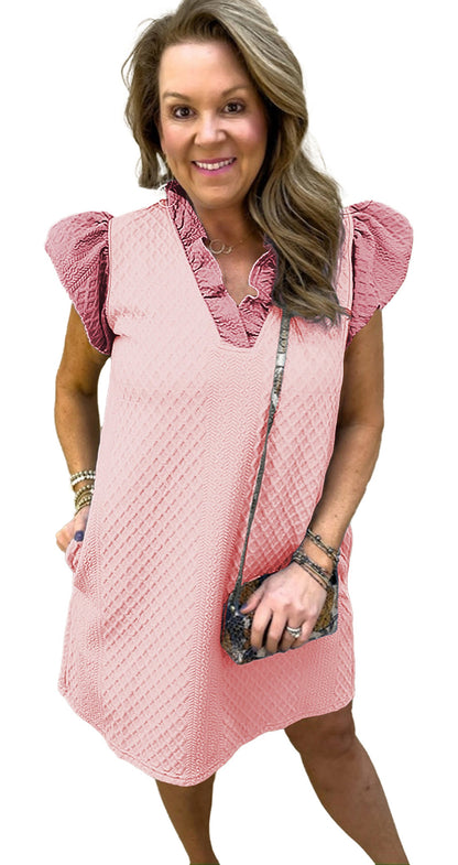 Light pink puff sleeve mini dress with a ruffled neckline and pockets from LuckeLadybug