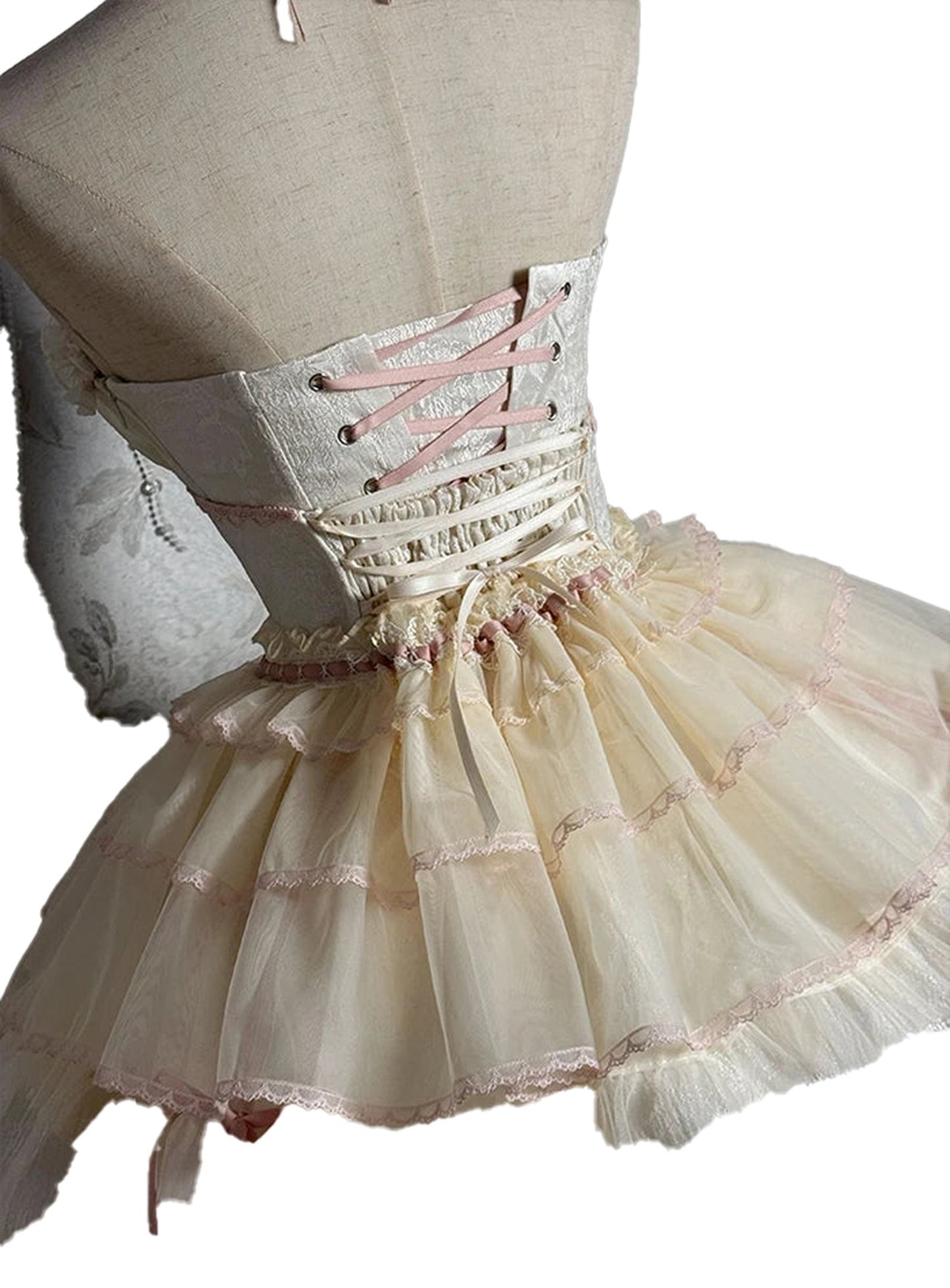 Sweet Lolita corset skirt in cream with lace trim and pink ribbon detailing, perfect for elegant outfits
