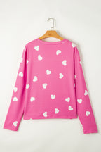 Pink LuckeLadybug LLC Shorts with heart to print pattern for a fun and playful look