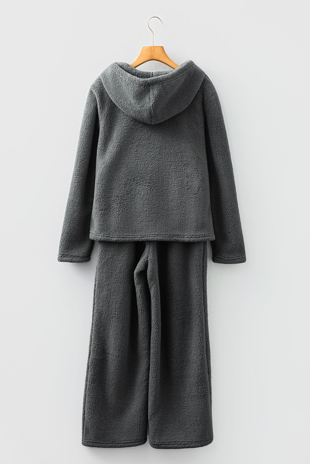 Cozy gray lounge pants with matching hoodie for comfortable relaxation and home wear