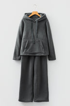 Cozy dark gray lounge pants with matching hoodie for relaxed comfort at home
