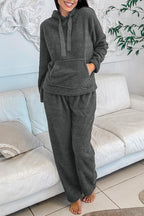 Cozy gray lounge pants paired with a matching hoodie, perfect for casual relaxation at home