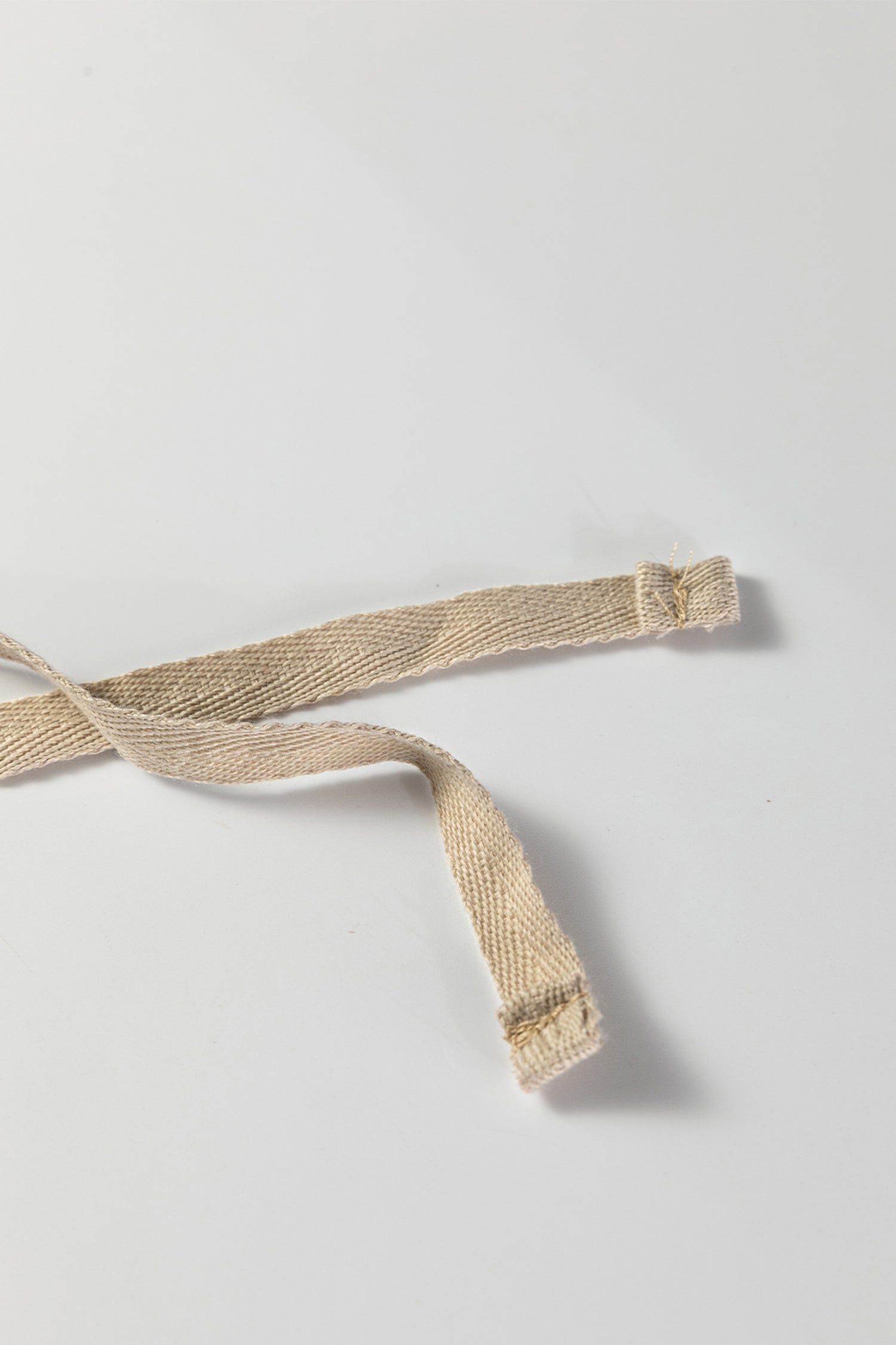 Close-up of beige fabric straps used in a lounge room set from LuckeLadybug LLC