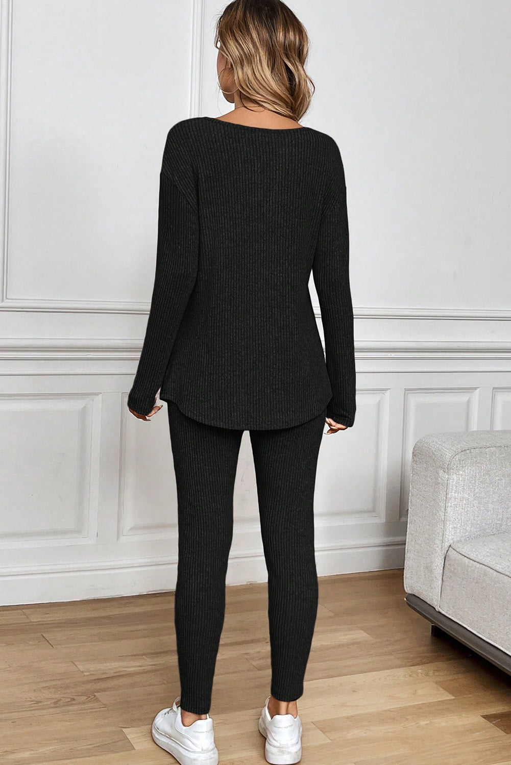Black ribbed lounge set featuring a long sleeve top and fitted pants for comfort in your lounge room set