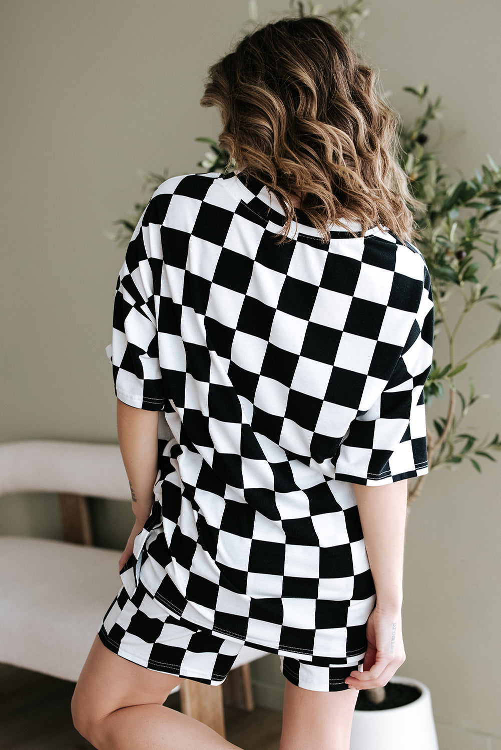 Women's black and white checkered shorts from LuckeLadybug LLC, perfect for a lounge room set