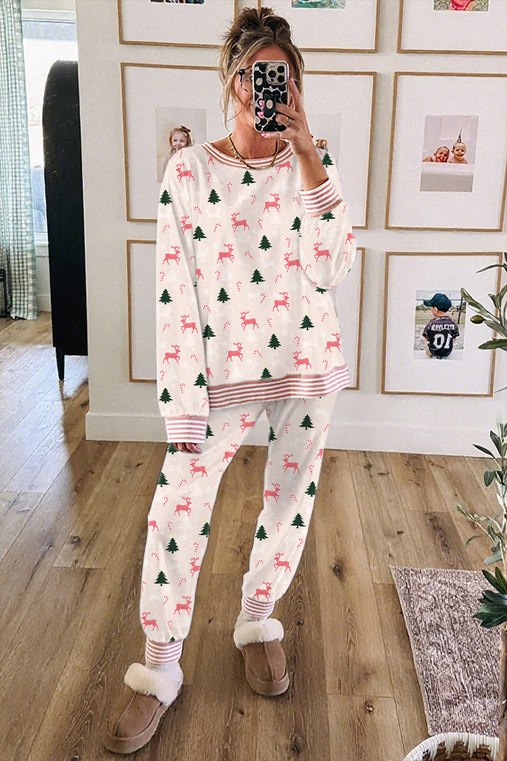 Cozy white lounge room set with pink reindeer and green trees for comfortable relaxation