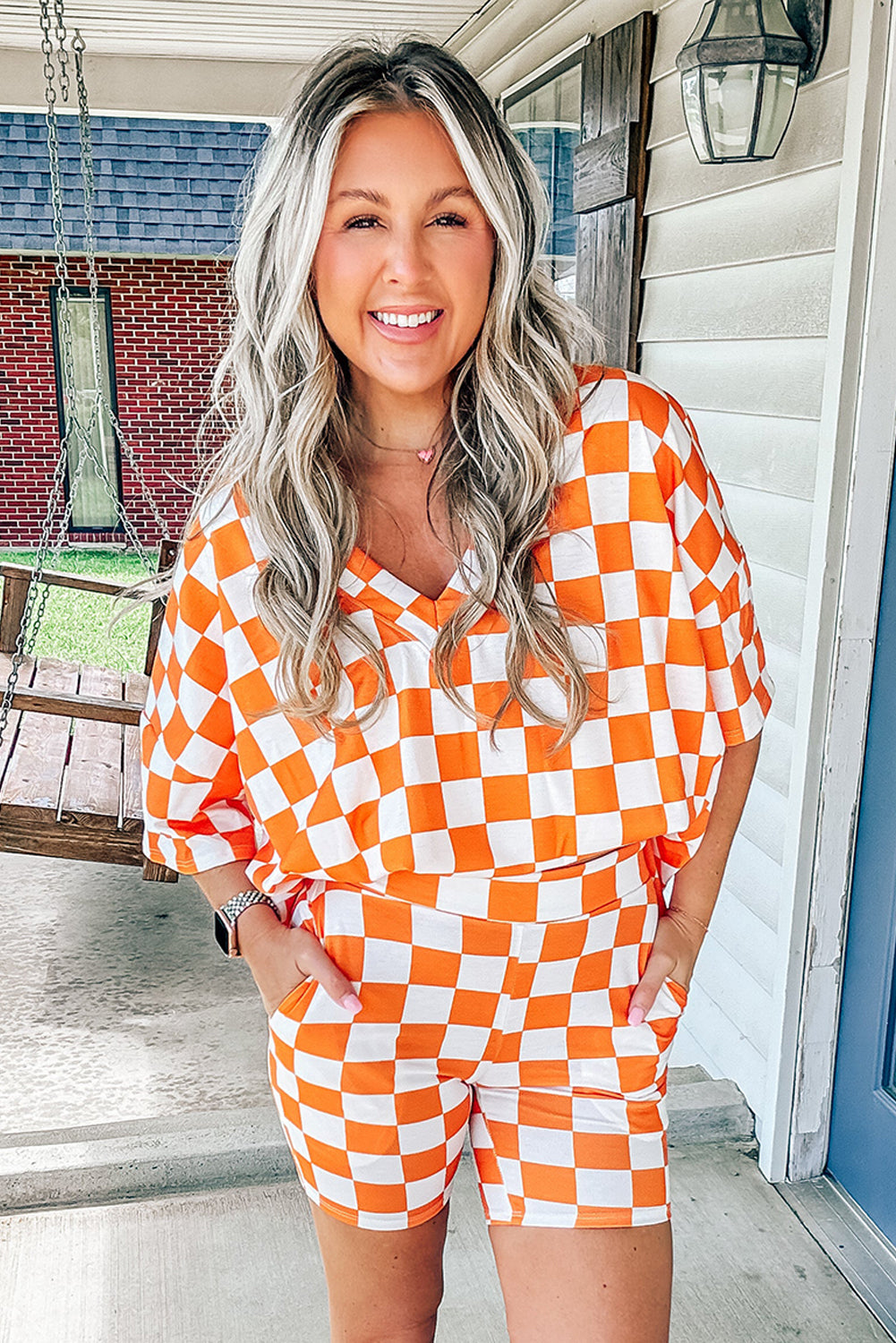 Orange and white checkered shorts from LuckeLadybug LLC, perfect for a lounge room set