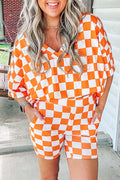 Orange and white checked shorts from LuckeLadybug LLC designed for a lounge room set