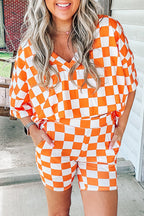 Orange and white checked shorts from LuckeLadybug LLC designed for a lounge room set