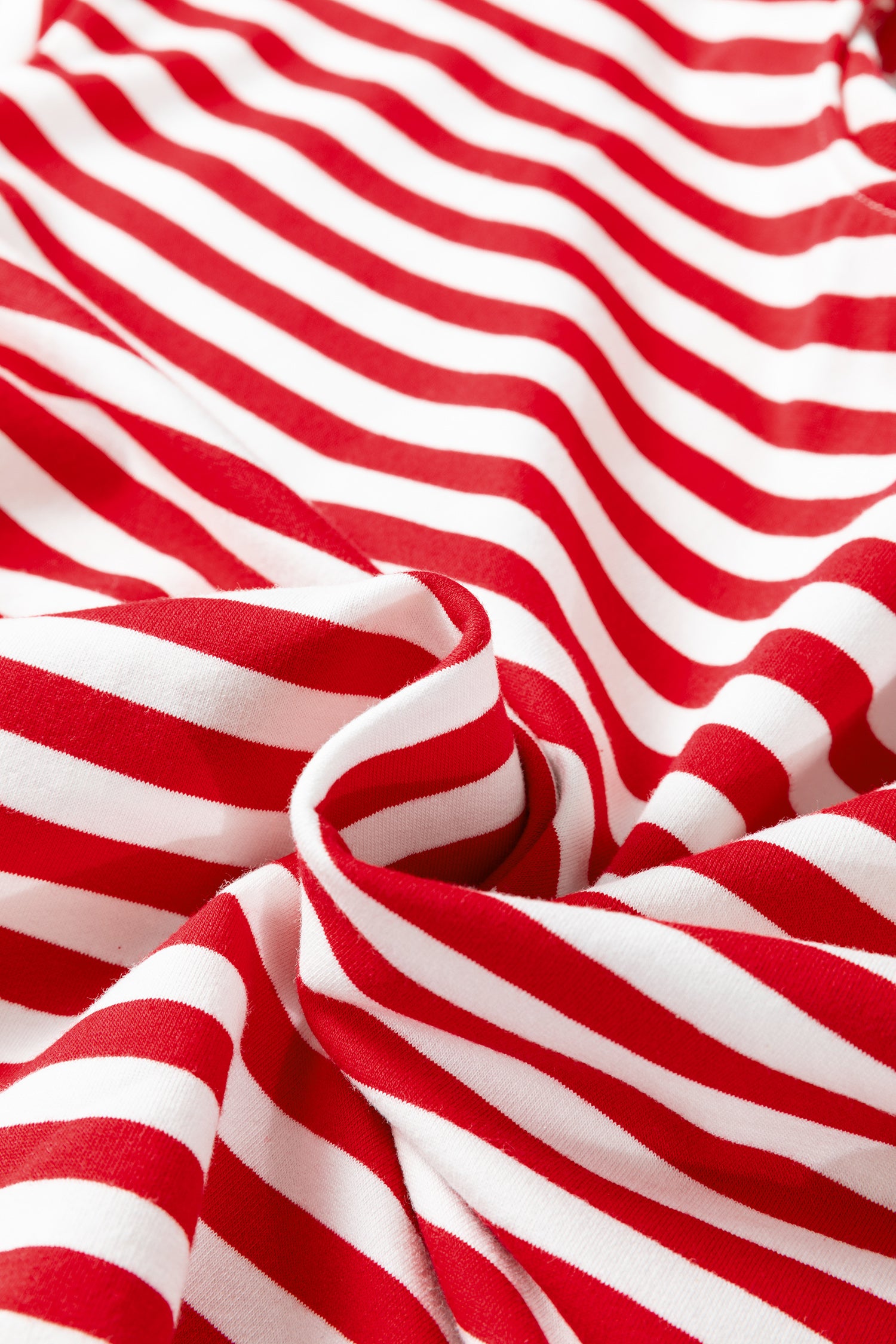 Red and white striped fabric for LuckeLadybug LLC loungewear set, perfect for cozy comfort