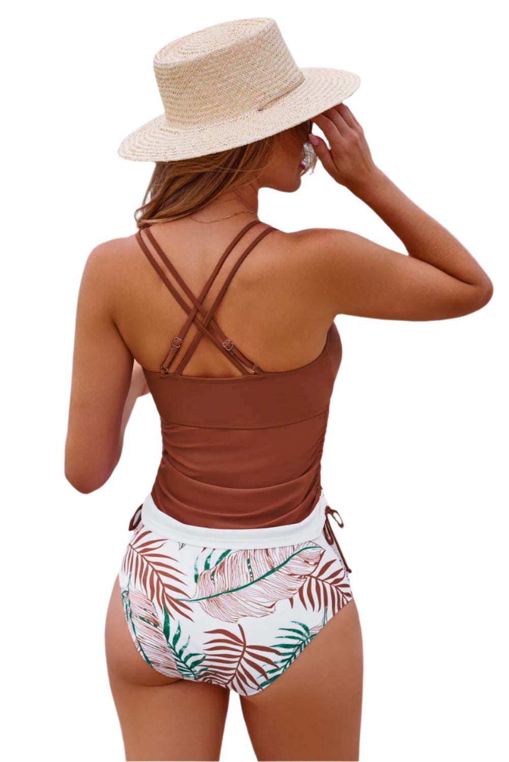 LuckeLadybug 2 piece tankini bathing suit with brown top and tropical print bottoms worn by woman with straw hat
