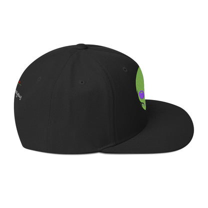 LuckeLadybug black snapback hat featuring a green alien head streetwear cap design on the front