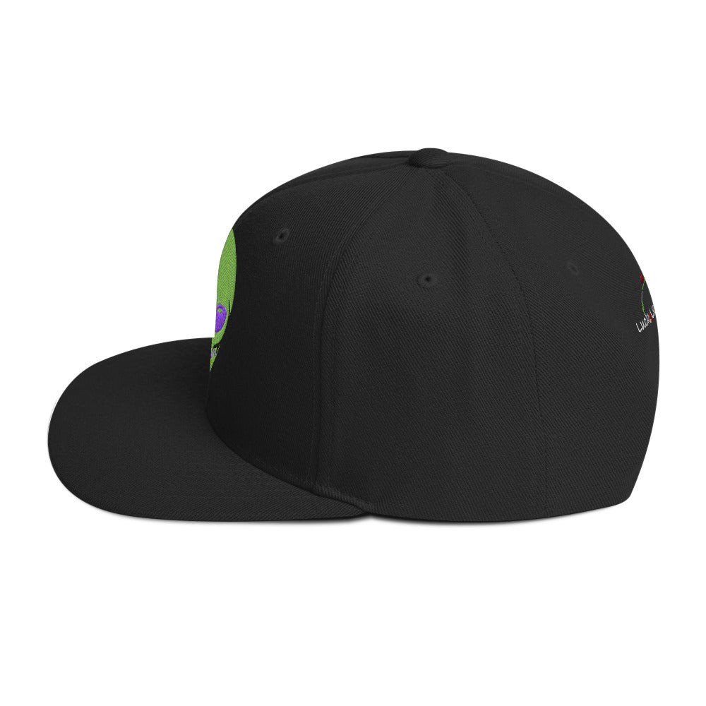 Black snapback hat featuring alien head streetwear cap design by LuckeLadybug