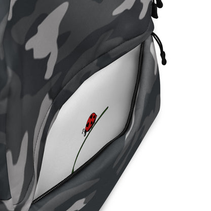 LuckeLadybug Black Camo Design Backpack For Everyday Use with open front pocket revealing ladybug print interior
