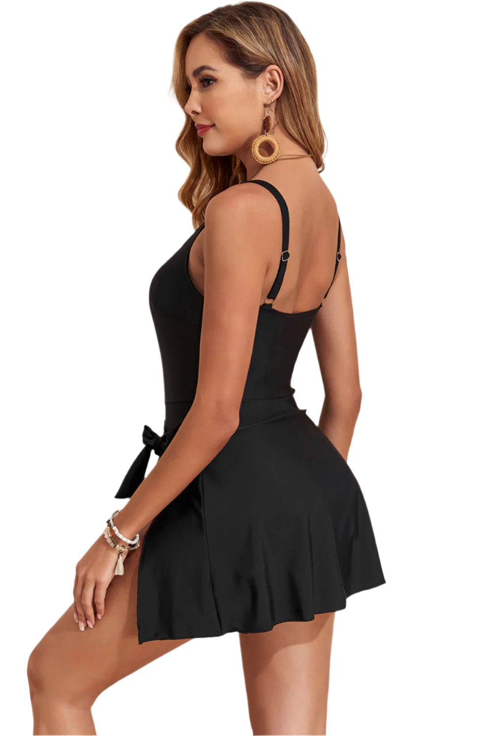 Black swim dress for women by LuckeLadybug LLC featuring adjustable straps and a flattering skirt design