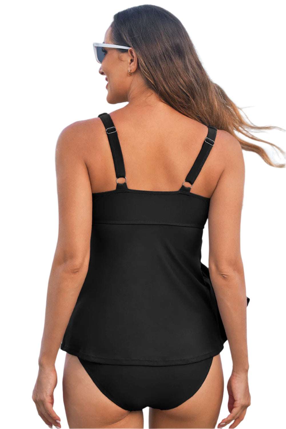 Back view of black v neck tankini top by LuckeLadybug LLC with adjustable straps on model
