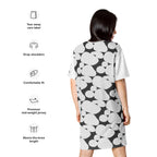 Back view of chic black and white t-shirt dress with drop shoulders and above-the-knee length by luckeladybug