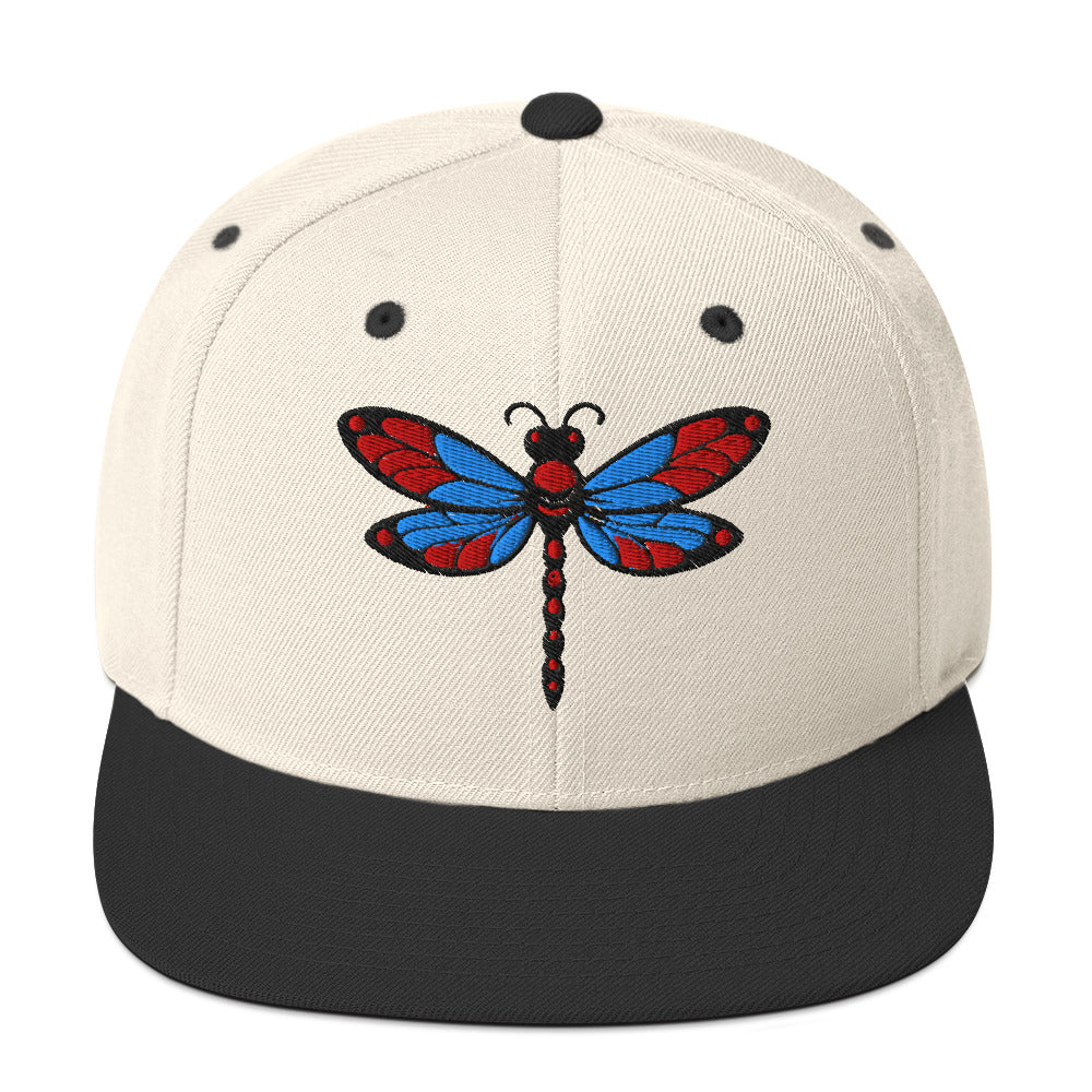 LuckeLadybug dragonfly snapback hat with embroidered red and blue dragonfly on white crown and black brim