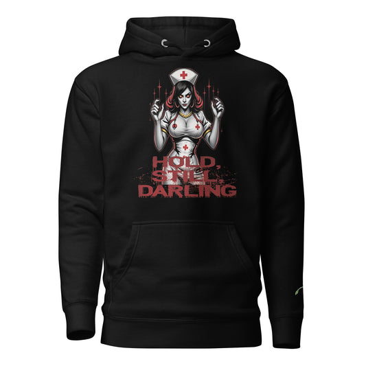 Black evil nurse hoodie with graphic of sinister nurse holding syringes and hold still darling text