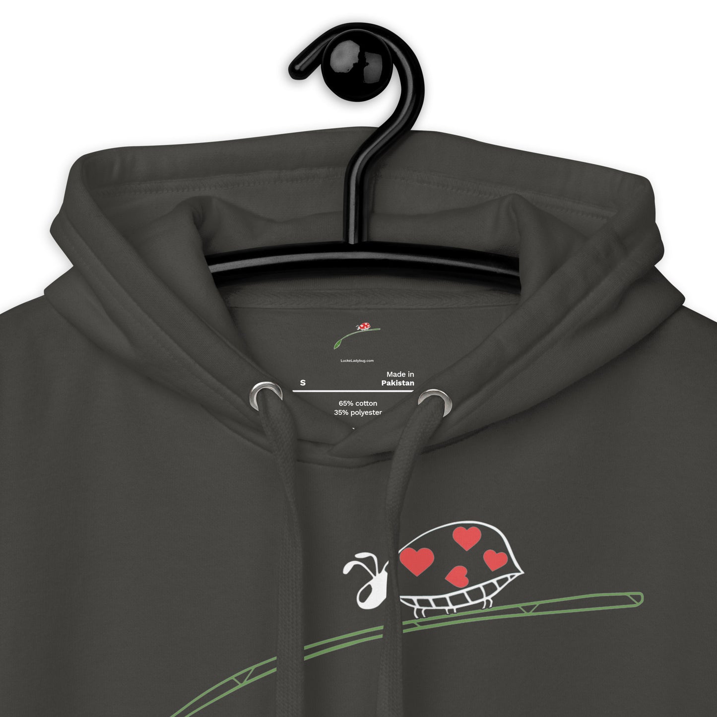 fashion-forward men's hoodie in dark color with heart-themed graphic on front