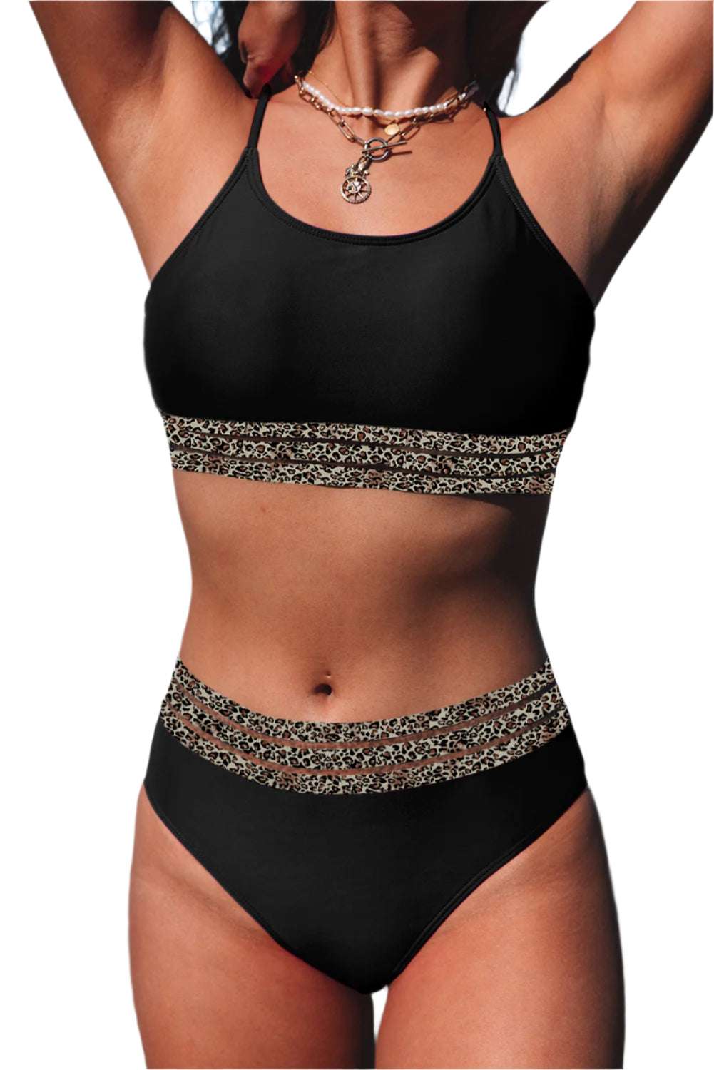 Black bikini with leopard print trim by LuckeLadybug LLC showcasing fashion forward swimwear for women